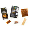 Curry kit, coconut milk, and other ingredients on a white background